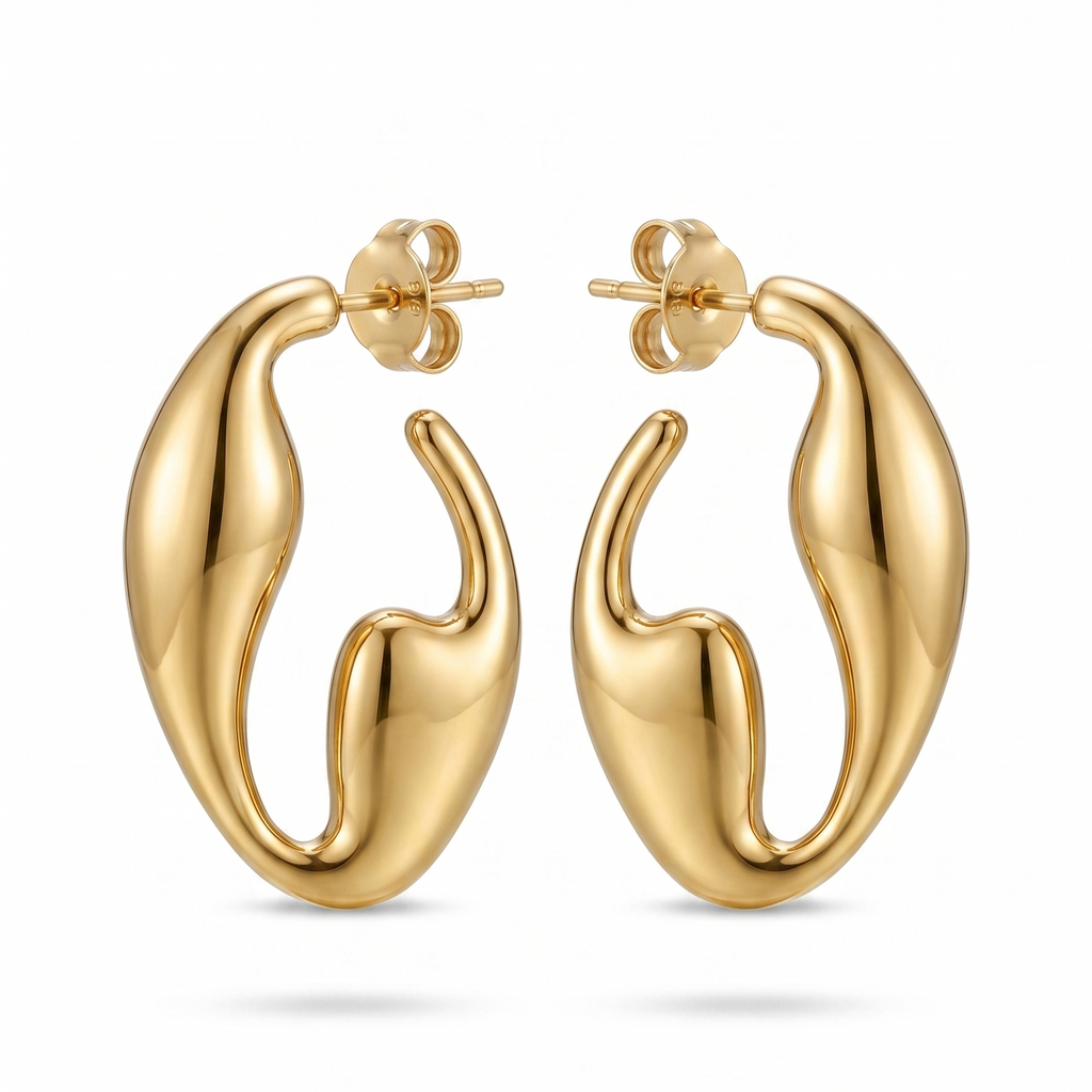 Gold hoop earrings on a white background