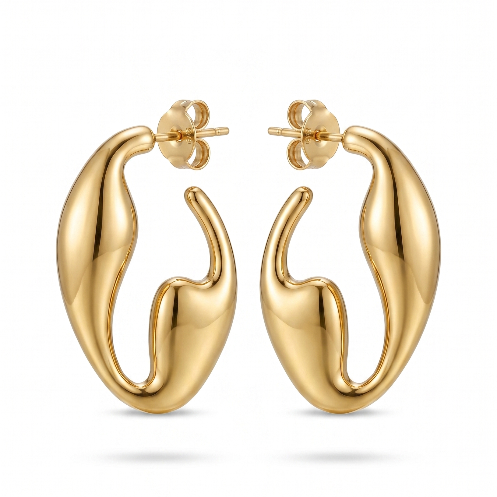 Gold hoop earrings on a white background