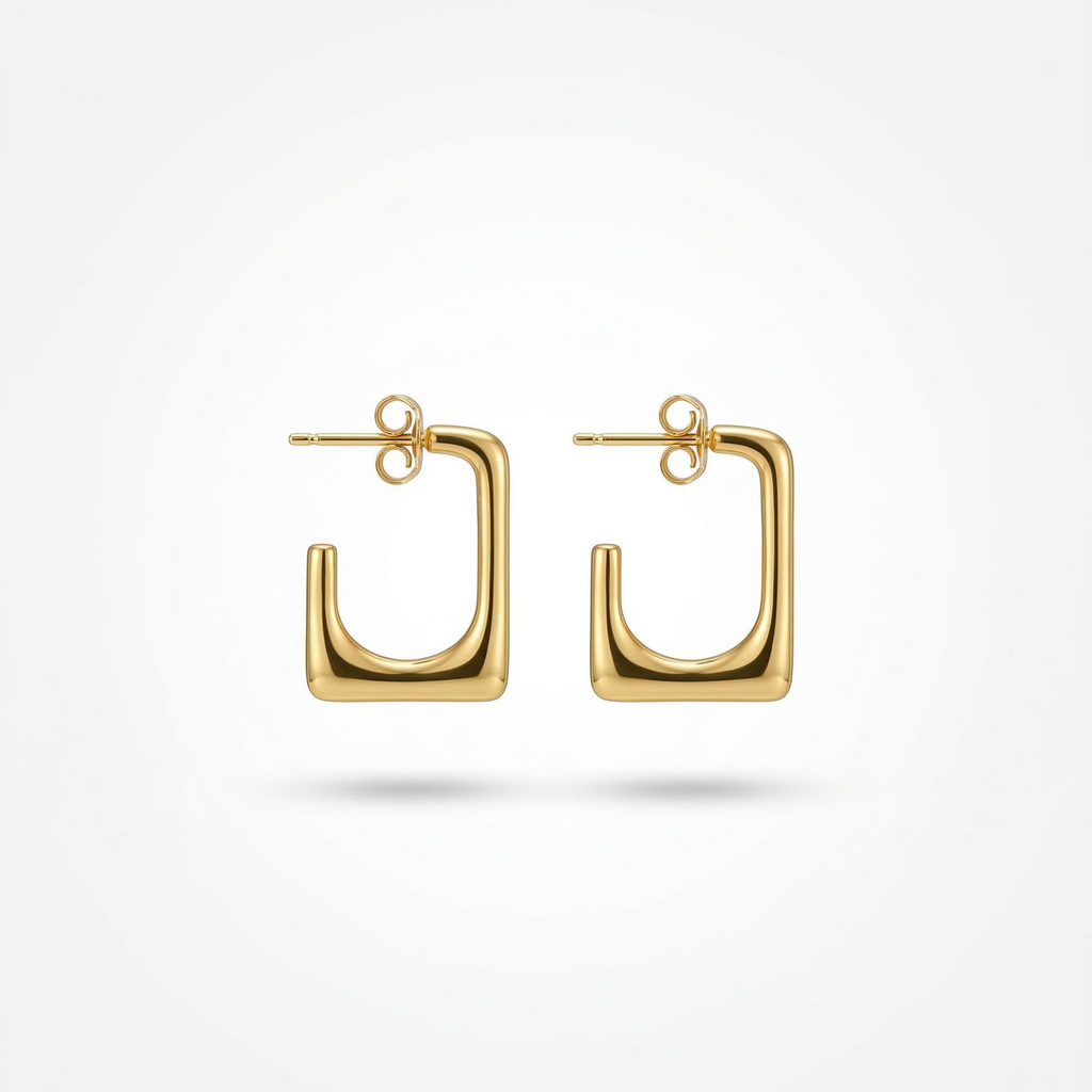Gold hoop earrings on a white background