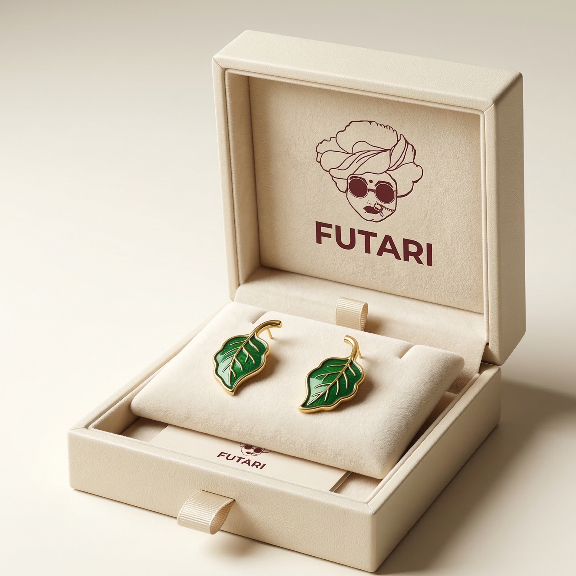 Jewelry box with green leaf earrings and 'FUTARI' branding on a light background