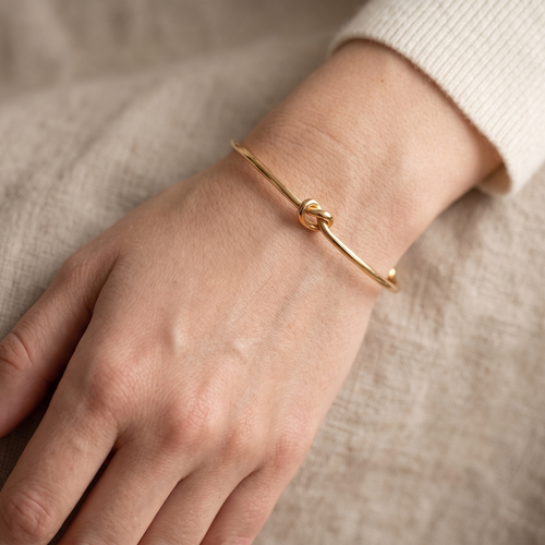 Elegant Golden Love Knot Cuff Bracelet – Minimalist Open Bangle