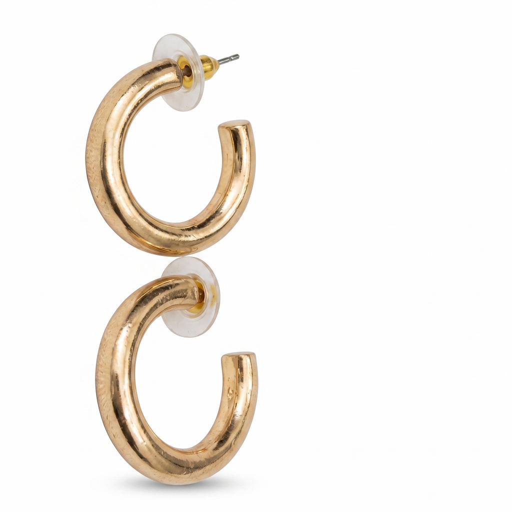 Gold hoop earrings on a white background