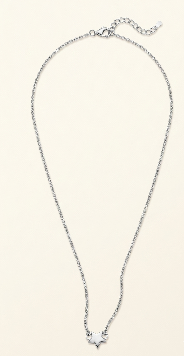 Silver necklace with a star pendant on a light beige background