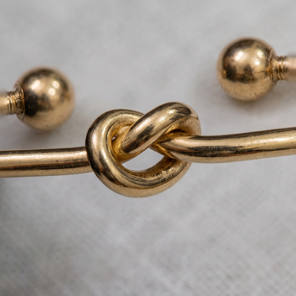 Elegant Golden Love Knot Cuff Bracelet – Minimalist Open Bangle