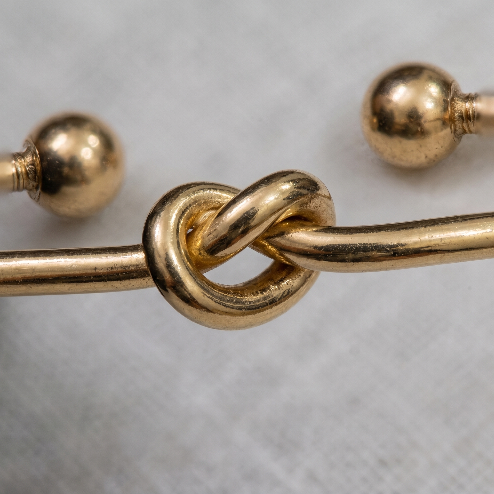 Elegant Golden Love Knot Cuff Bracelet – Minimalist Open Bangle