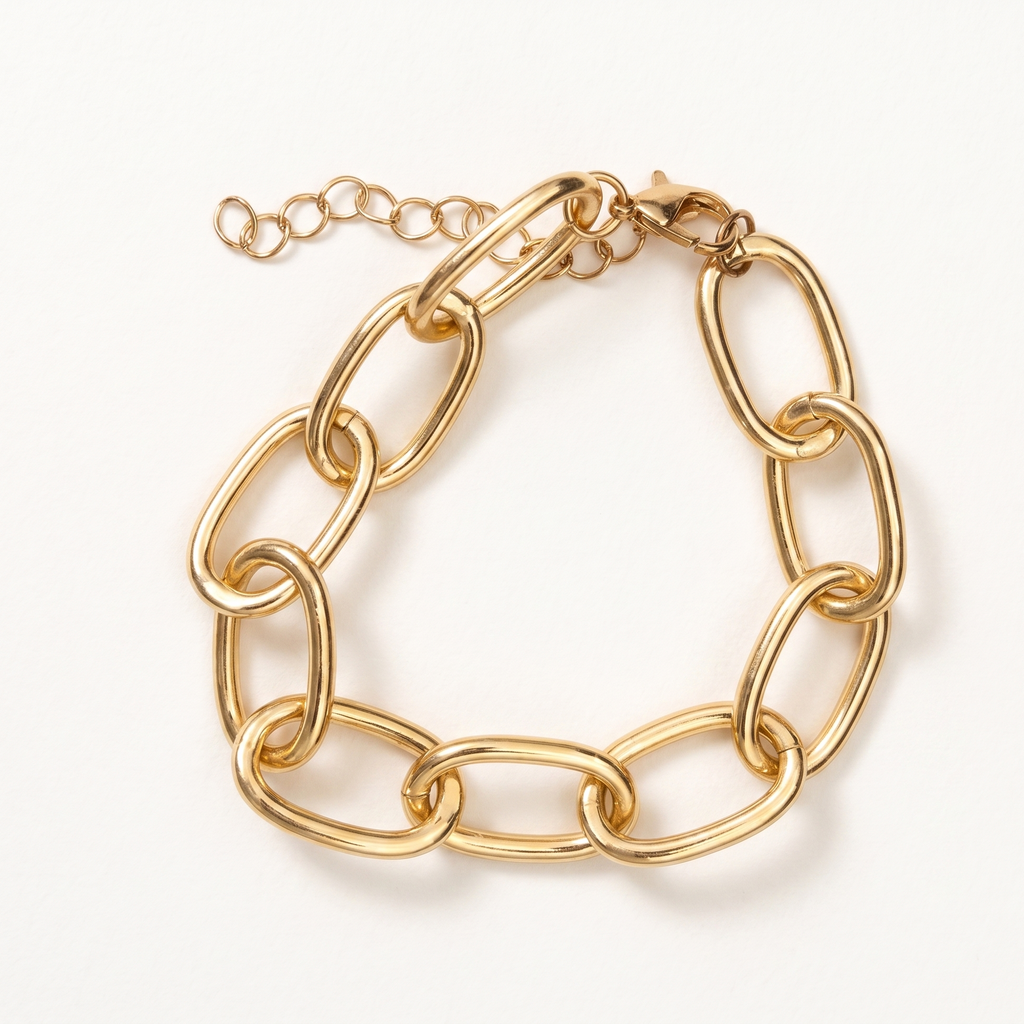 Gold chain bracelet on a white background