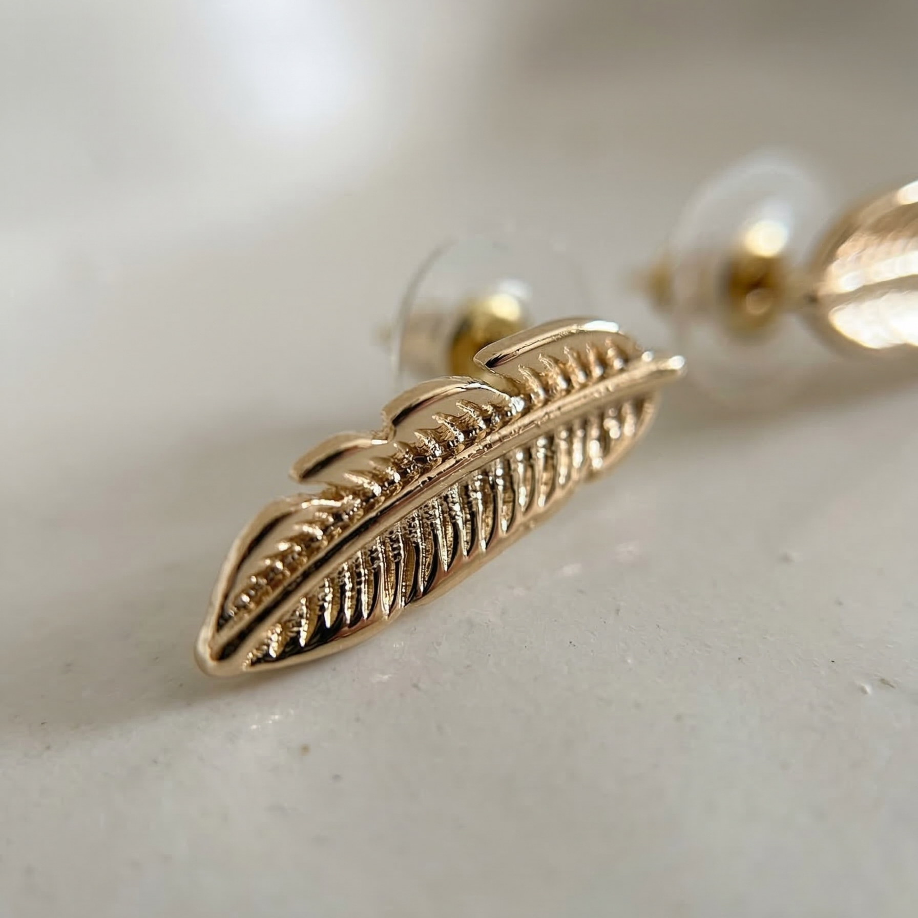 The Pluma Leaf Studs – Champagne Gold Finished Brass Earrings