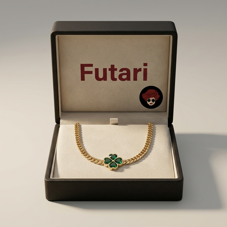 Gold necklace with a green clover pendant in a 'Futari' branded box.