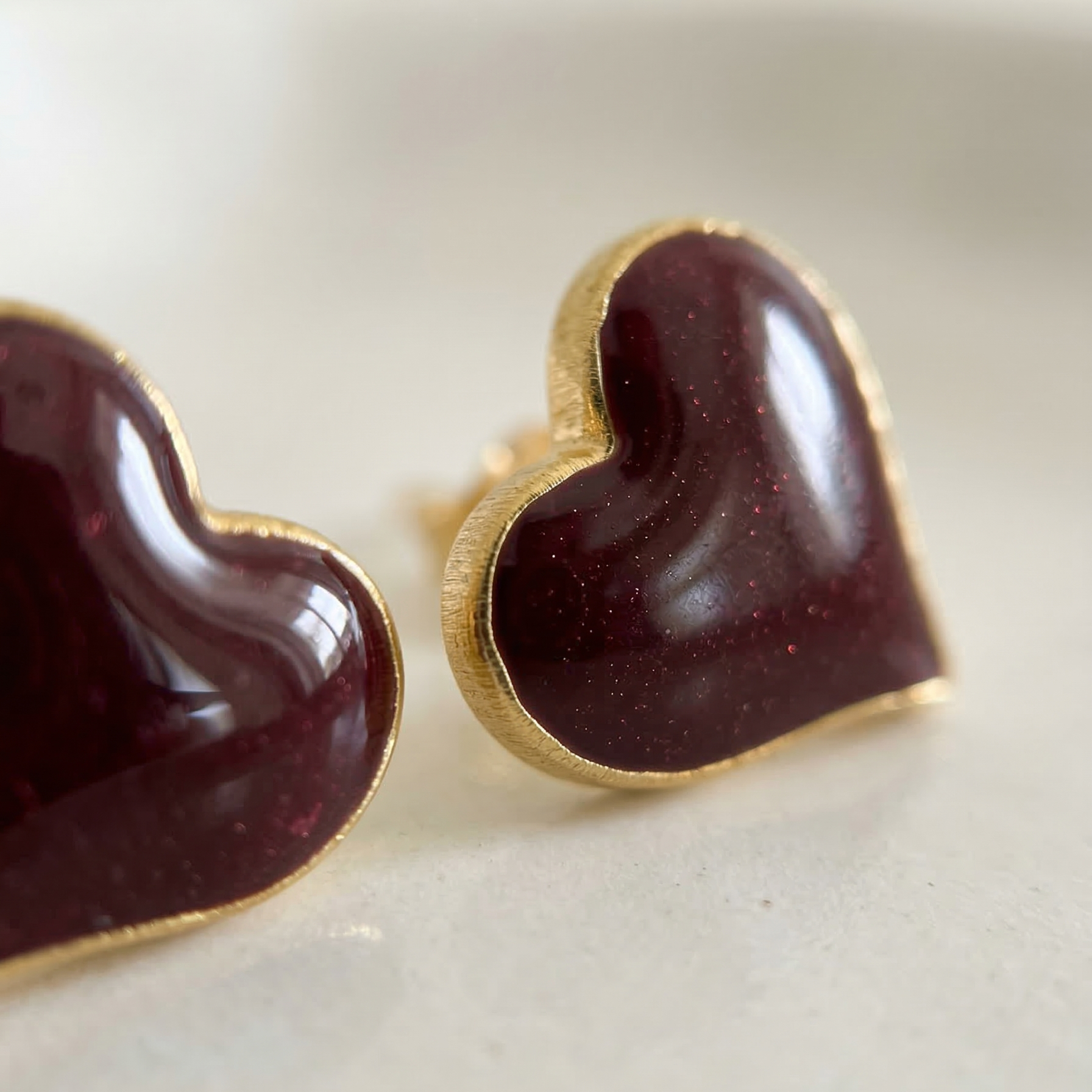 Heart-shaped chocolate cookies on a white plate