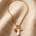 Celestial Anti-Tarnish Gold Necklace – Baroque Pearl, Star & Orb Charm Cluster