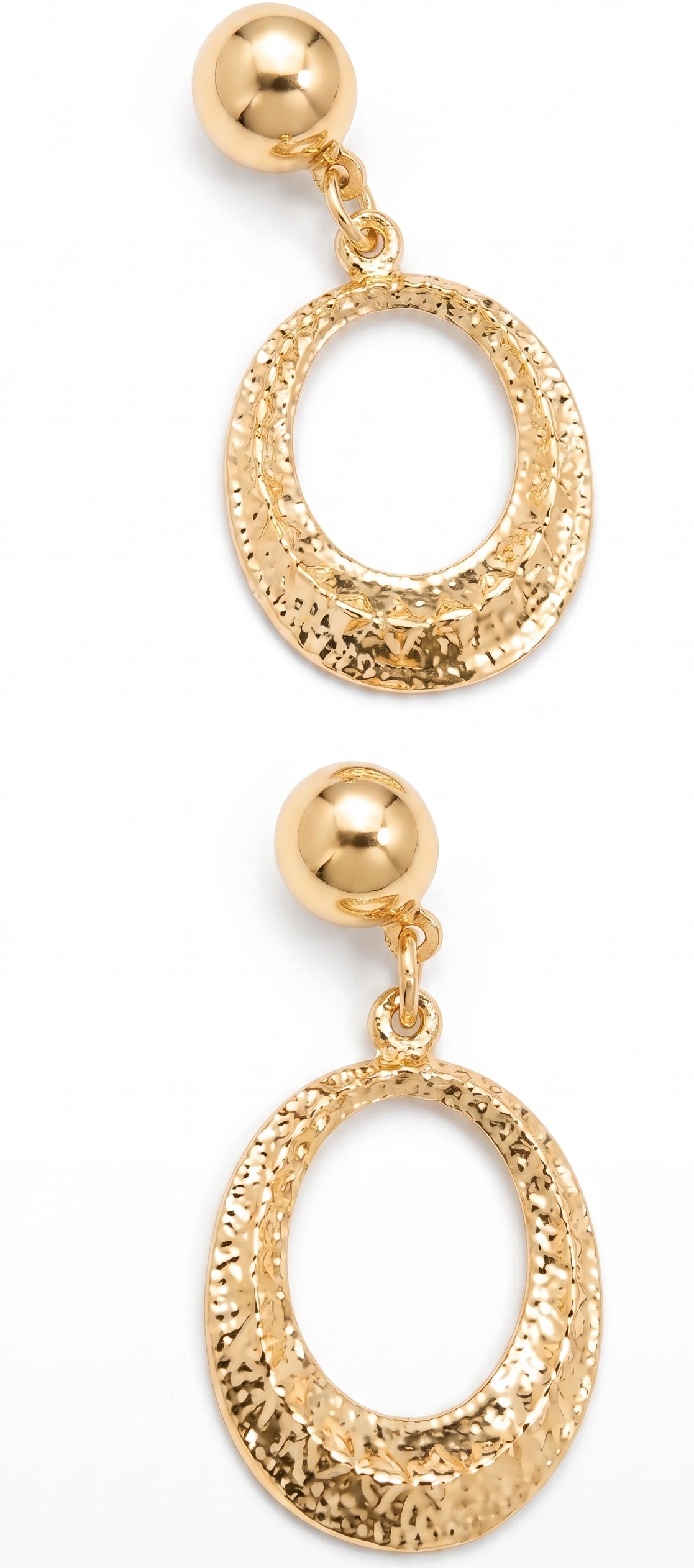 Pair of gold earrings with textured oval designs on a white background