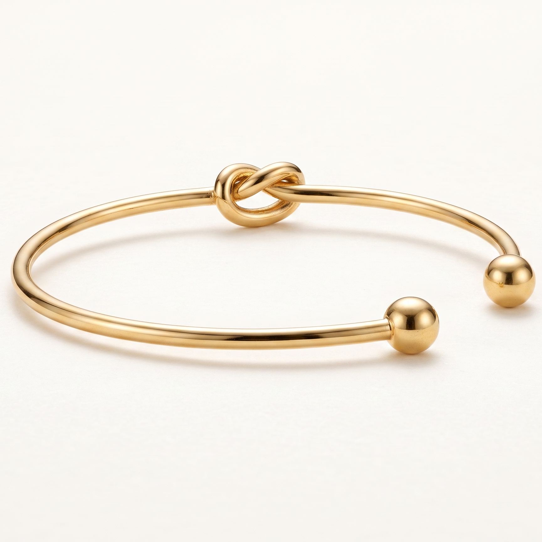 Elegant Golden Love Knot Cuff Bracelet – Minimalist Open Bangle