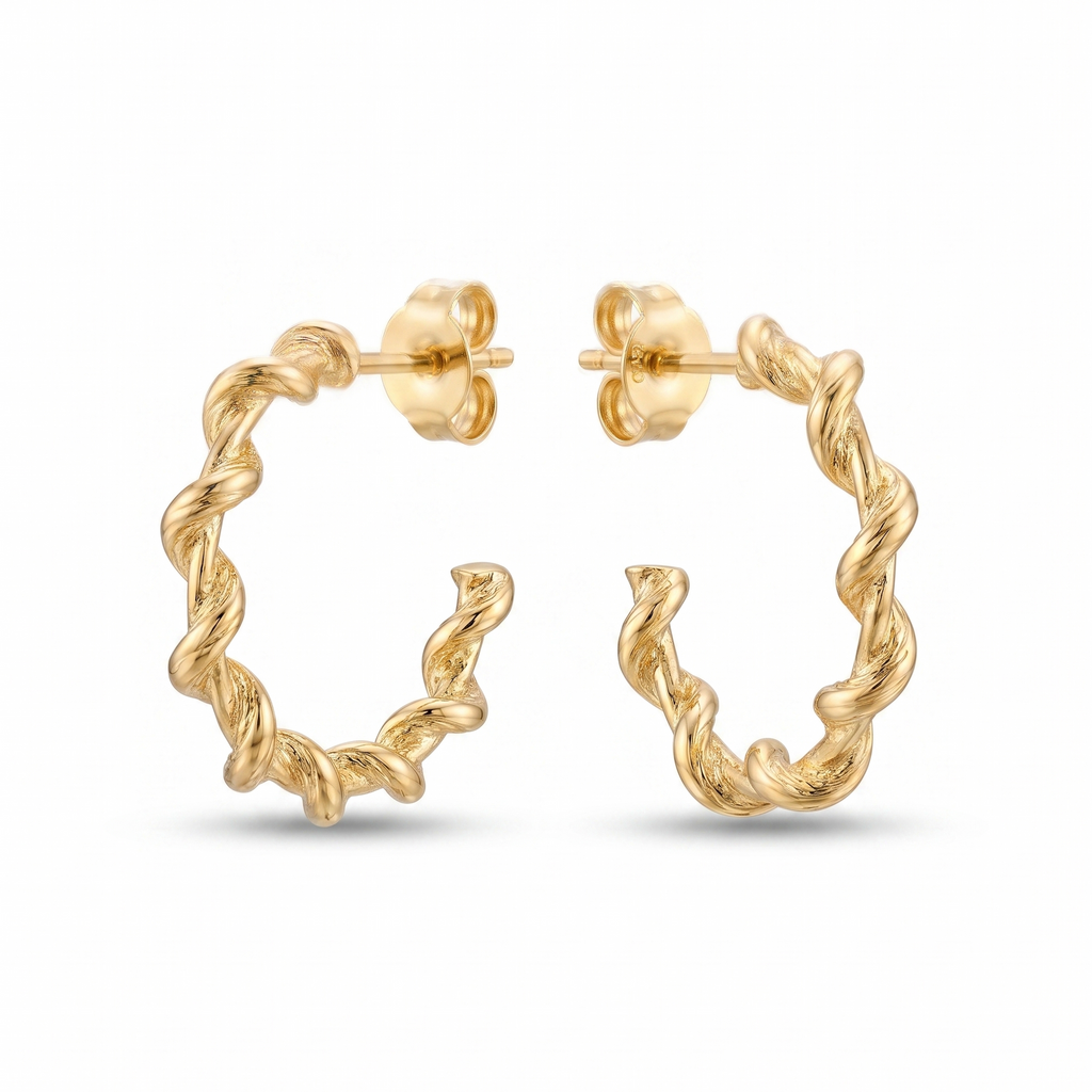 Gold hoop earrings on a white background