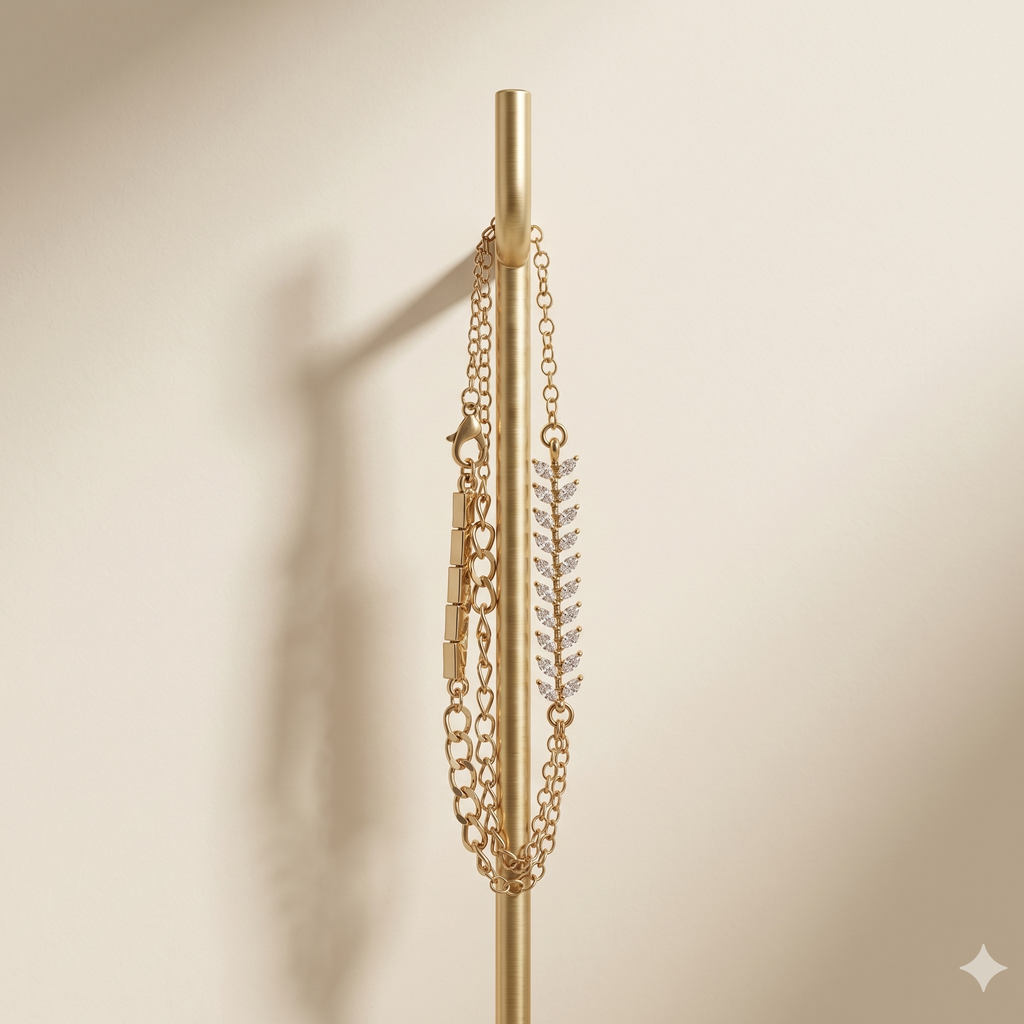 Gold decorative item with chains and a central design on a beige background