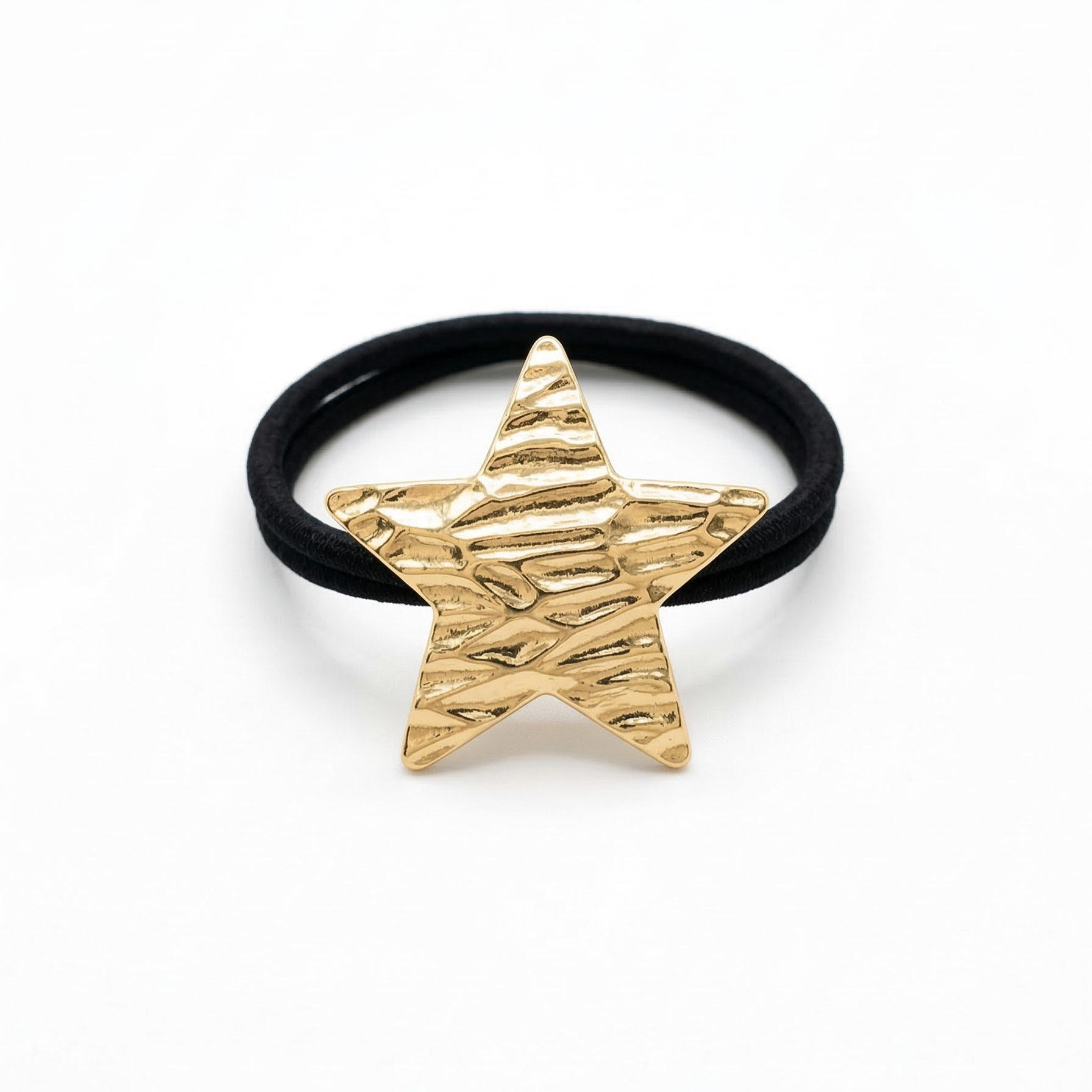 Black hair tie with a gold star-shaped clip on a white background